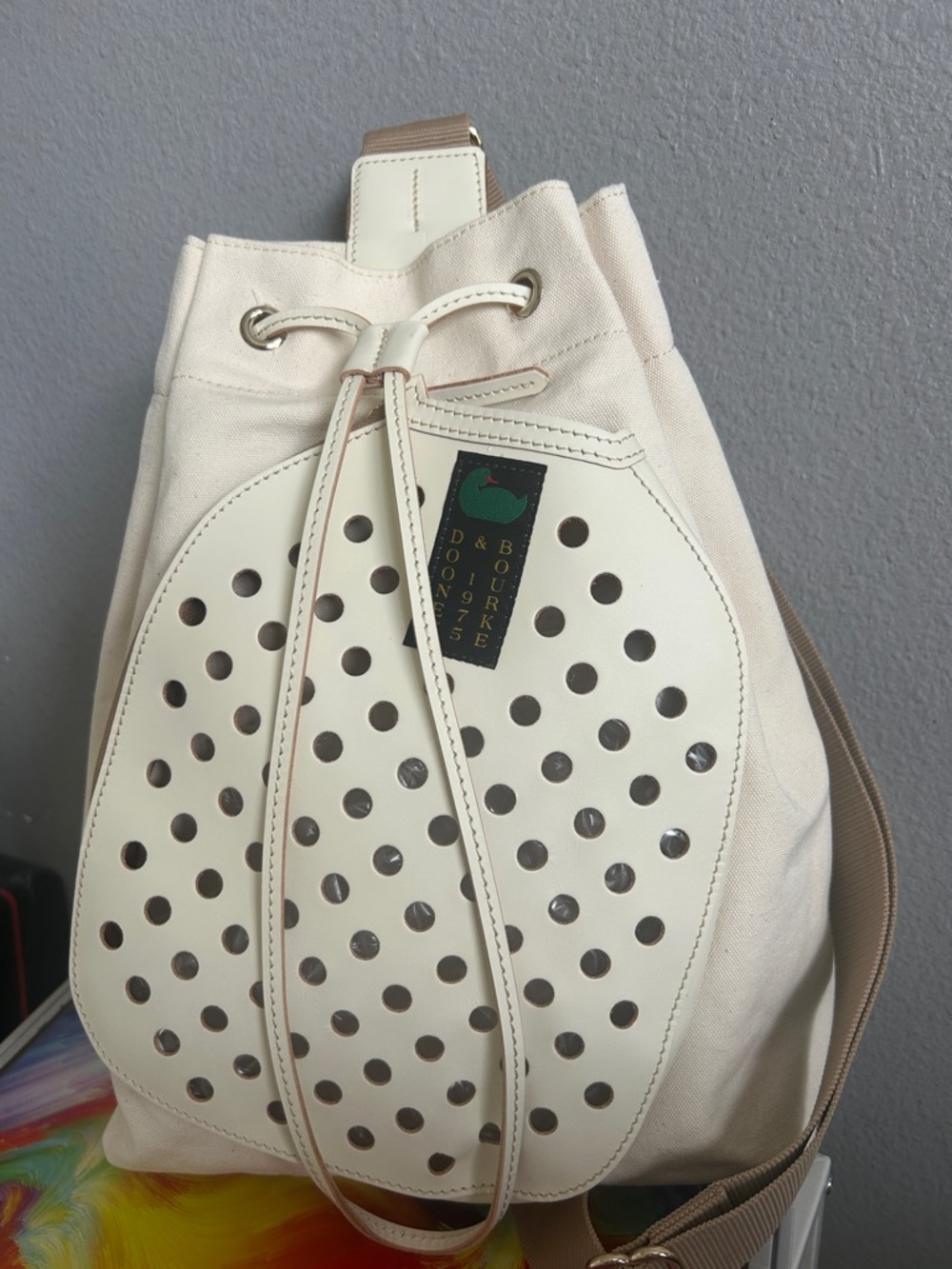 Dooney & Bourke Cream Canvas Perforated Drawstring Backpack